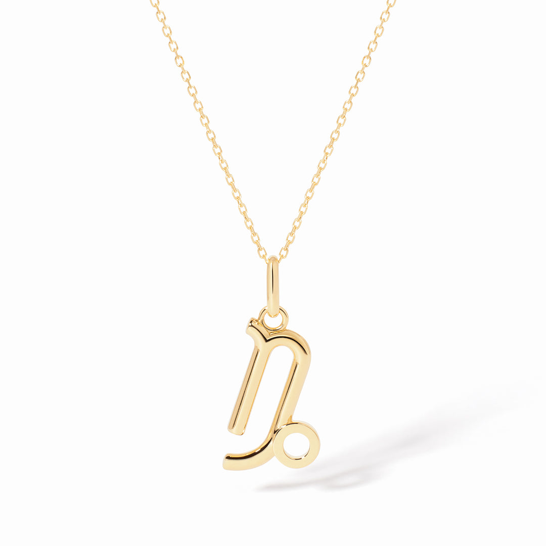 Pendentif dinh van Les Signes Capricorne petit modèle en or jaune 18k 789101