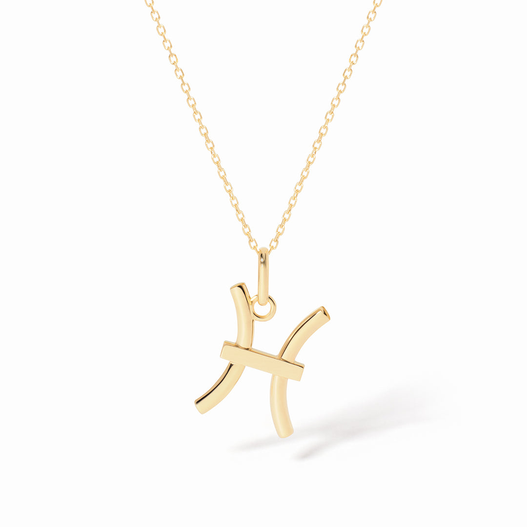 Pendentif dinh van Les Signes Poisson petit modèle en or jaune 18k 789121