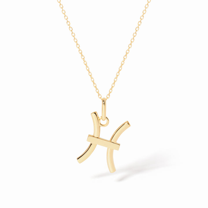 Pendentif dinh van Les Signes Poisson petit modèle en or jaune 18k 789121