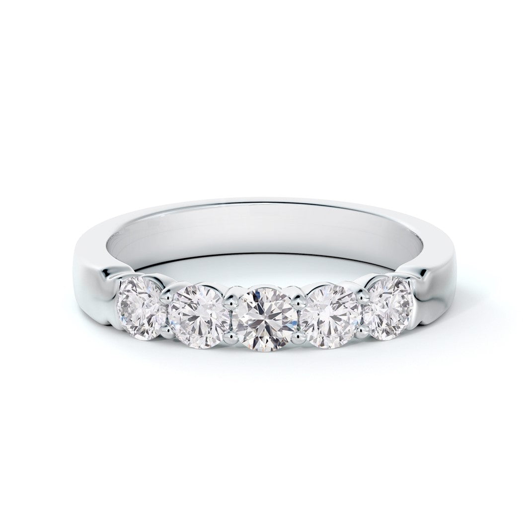 Bague alliance en platine à griffes partagées sertie de diamants 0.75 ct