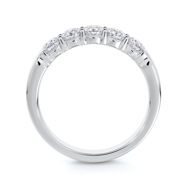 Bague alliance en platine à griffes partagées sertie de diamants 0.75 ct
