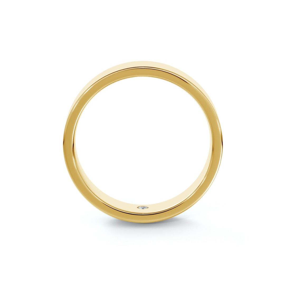 Bague alliance en or jaune 18k largeur 5mm sertie d'un diamant caché 0.02 ct