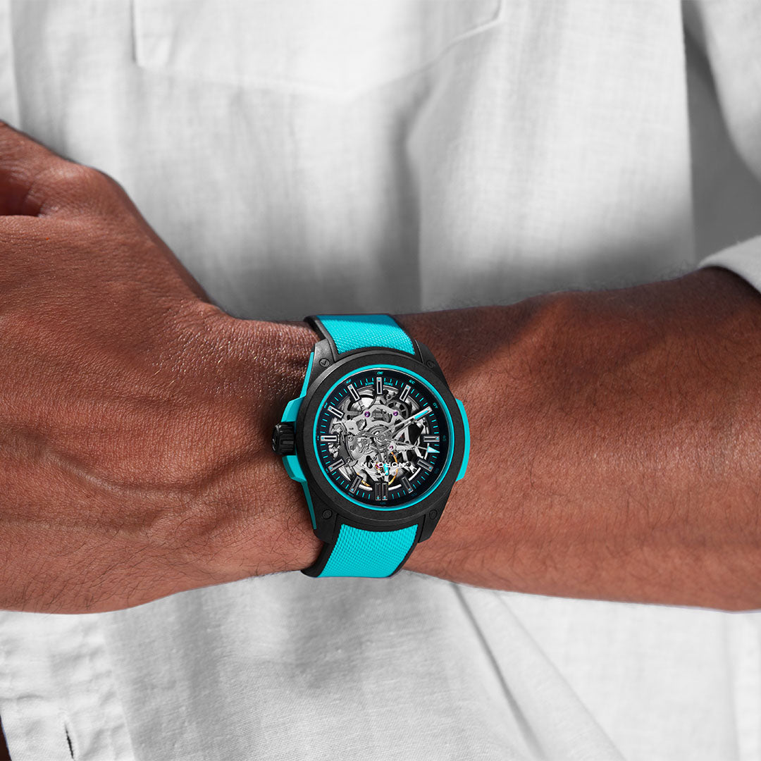 Montre NORQAIN Wild ONE Skeleton Turquoise automatique en matériau NORTEQ® à base de fibre de carbone bracelet caoutchouc 42 mm