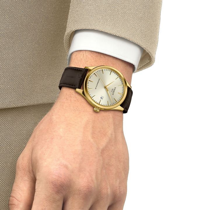 Montre Tissot Classic Dream automatique en acier inoxydable revêtement PVD or jaune bracelet cuir 40 mm T158.407.36.261.00